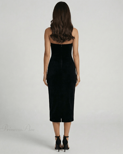 Celeste Midi Dress by Lauven, showcasing a sleek strapless design in a black sheath style from the back view.