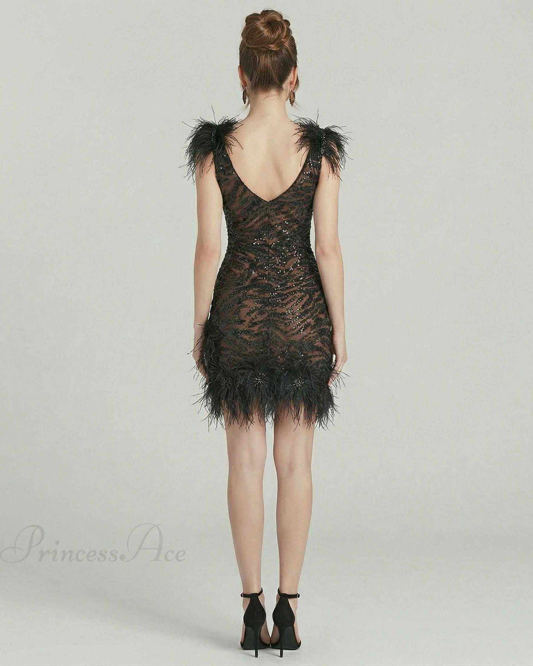 Celeste Mini Dress by Lauven, featuring feathered detailing and sequins, perfect for evening wear.
