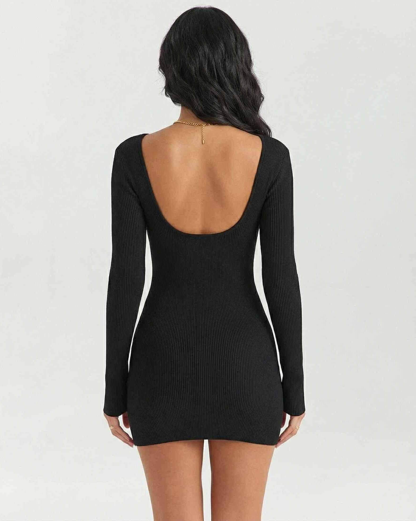 Back view of women’s Celeste Mini Dress by Lauven, featuring a ribbed texture and long sleeves in elegant black.