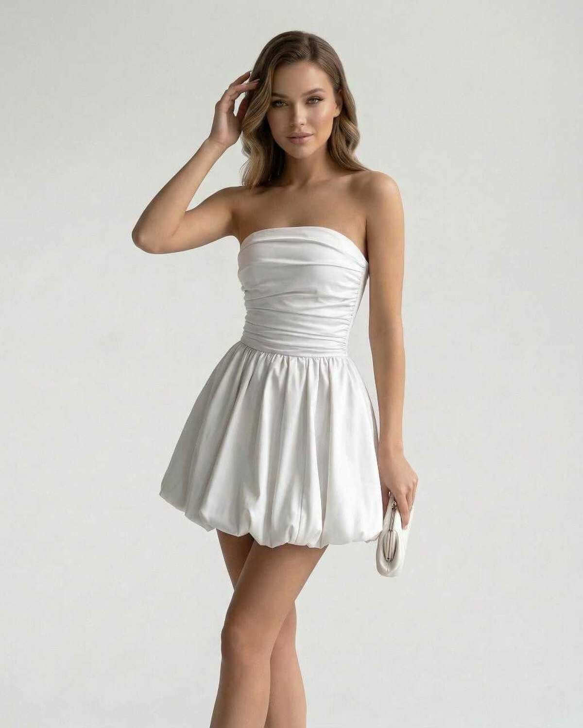 Celeste Mini Dress by Lauven - Elegant strapless white satin A-line mini dress featuring ruched bodice and playful bubble skirt.