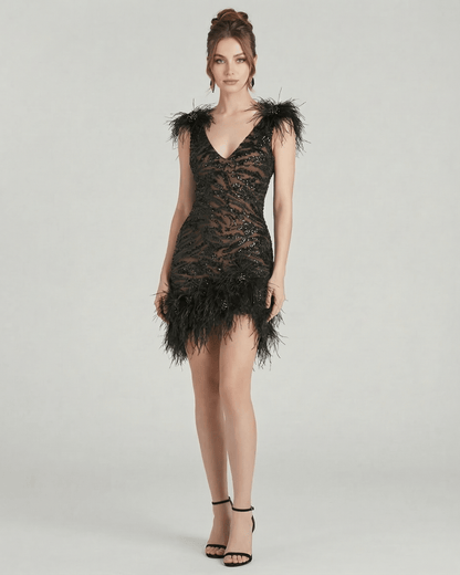 Celeste Mini Dress by Lauven featuring feathered detailing and sequin embellishments in a sleek black silhouette.