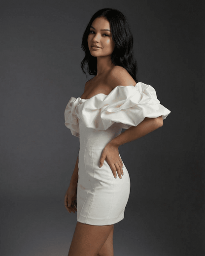 Celeste Mini Dress by SLIMONA featuring dramatic ruffle trim and structured bodice for a stunning look.