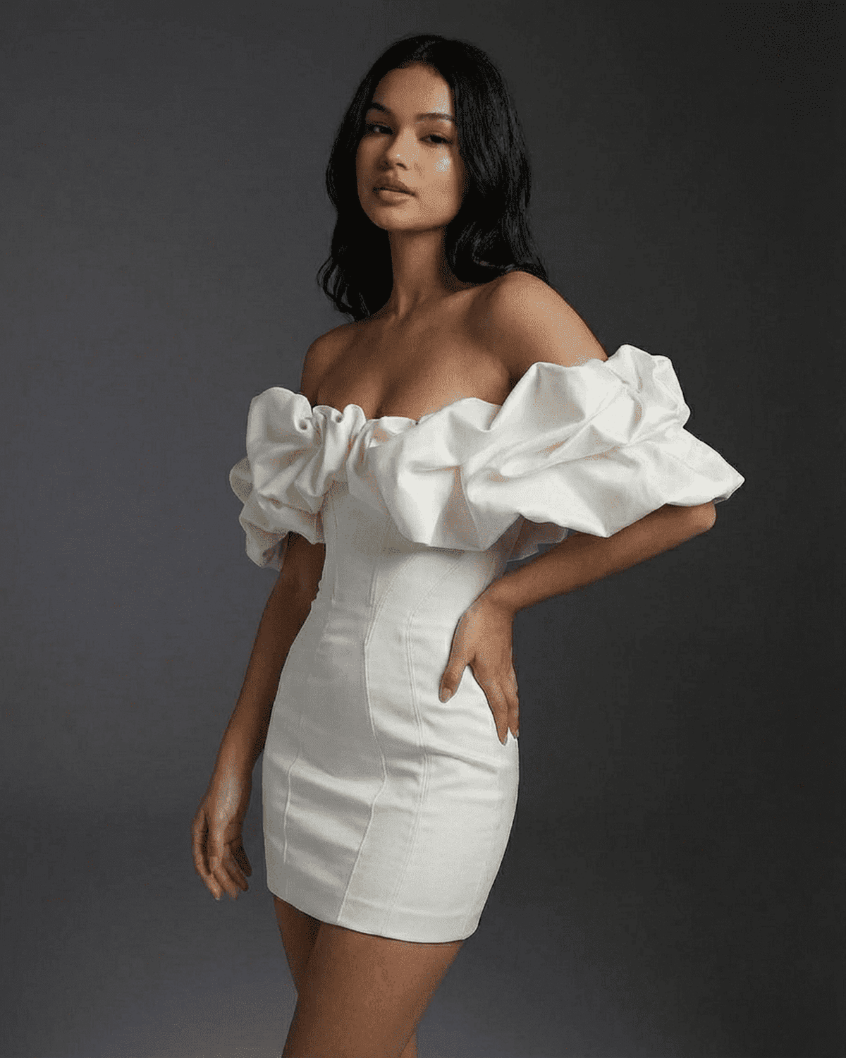Celeste Mini Dress by SLIMONA featuring dramatic ruffle trim and boned structure for a chic, tailored look.