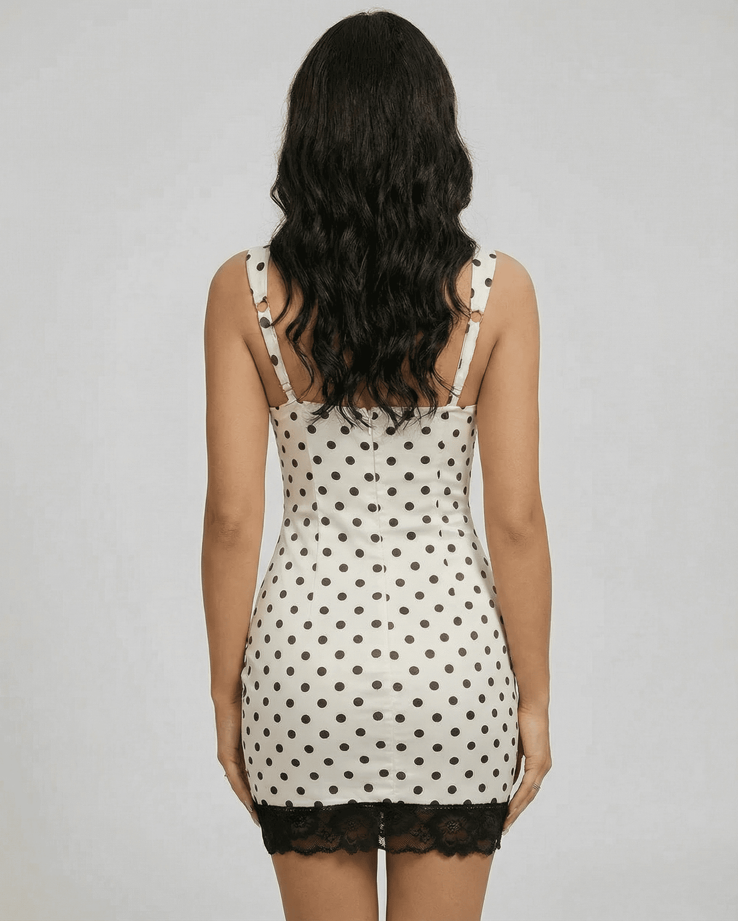 Celeste Mini Dress by SLIMONA - Elegant off-the-shoulder polka dot mini dress with lace hem.