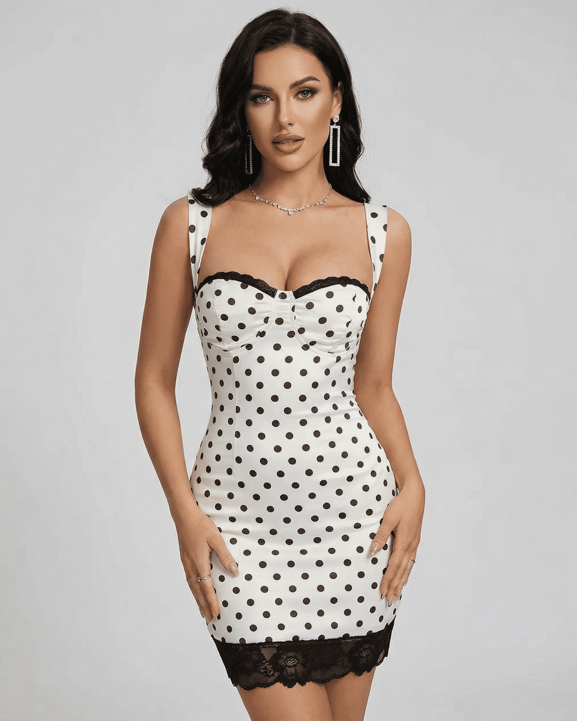 Celeste Mini Dress by SLIMONA, a stylish polka dot mini dress with lace trim and off-the-shoulder neckline.