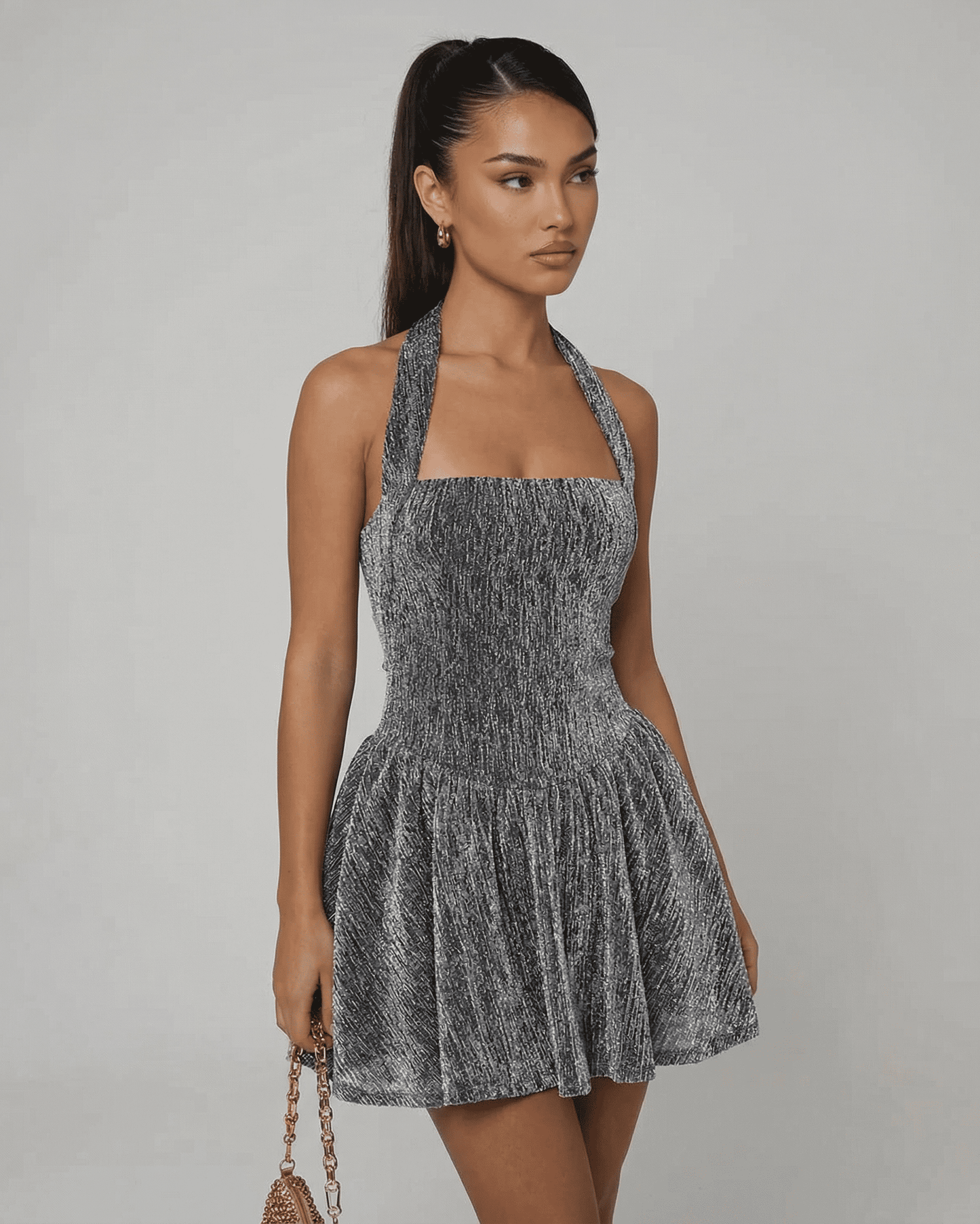 Celeste Mini Dress by SLIMONA featuring a sequin A-line silhouette and high waist finish.