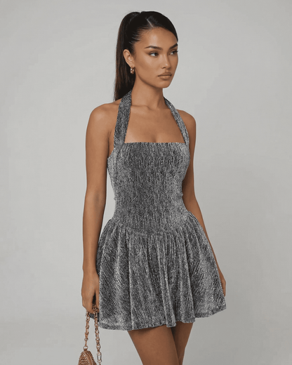 Celeste Mini Dress by SLIMONA featuring a sequin A-line silhouette and high waist finish.