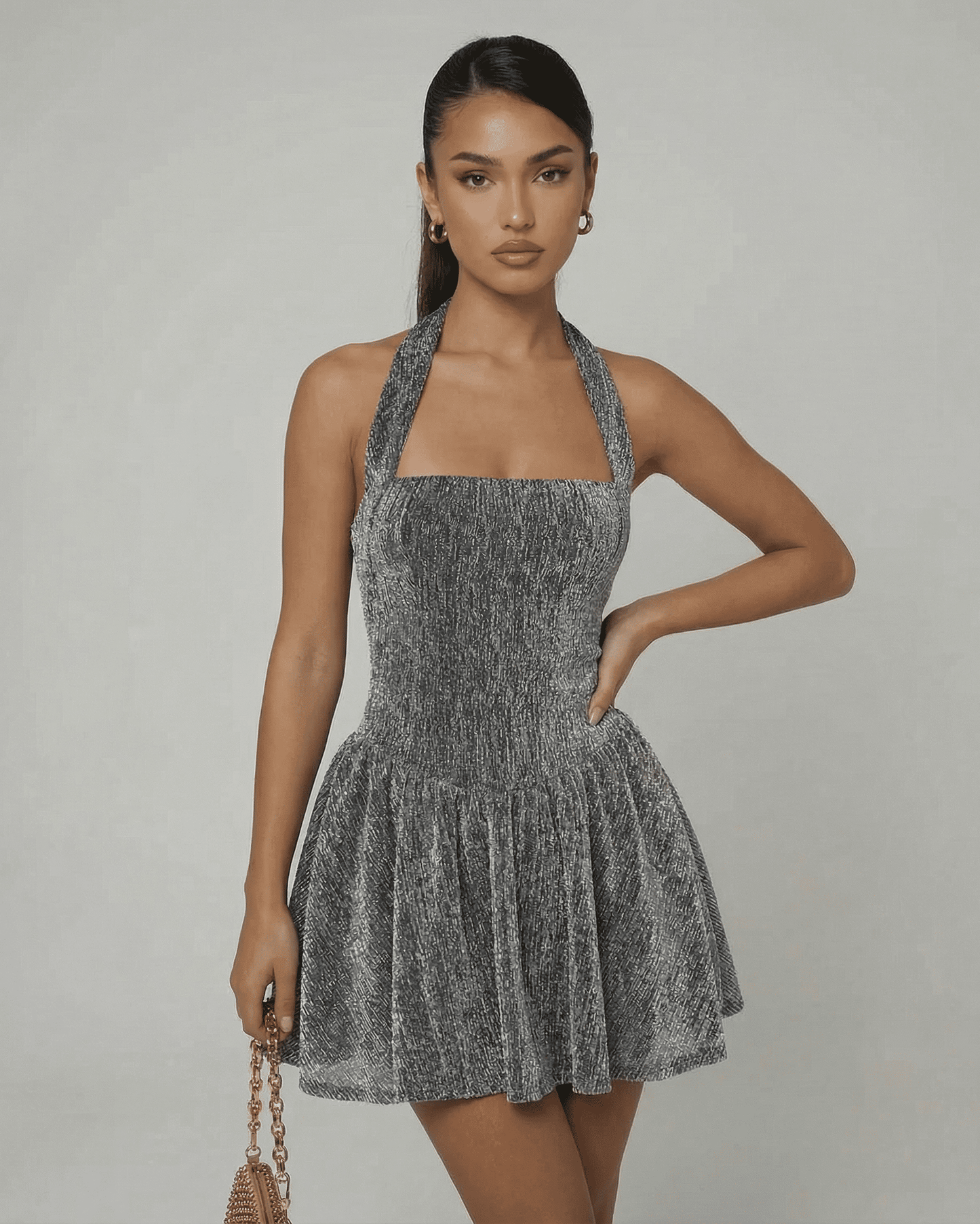 Celeste Mini Dress by SLIMONA, featuring a shimmering sequin texture and A-line silhouette, perfect for evening wear.