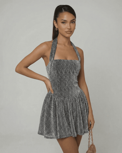 Celeste Mini Dress by SLIMONA - A-line sequin dress with high waist finish and collarless neckline in shimmering silver.