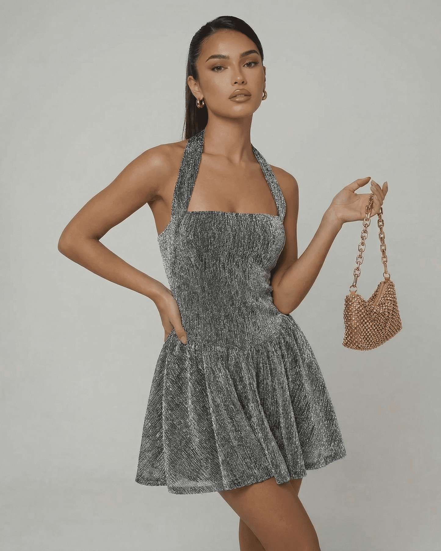 Celeste Mini Dress by SLIMONA features a shimmering sequin texture and A-line silhouette perfect for evening events.