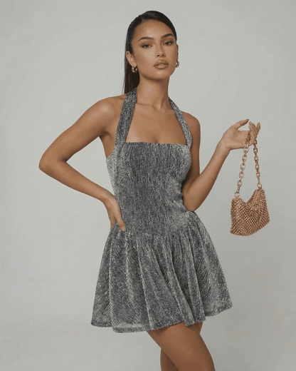 Celeste Mini Dress by SLIMONA features a shimmering sequin texture and A-line silhouette perfect for evening events.