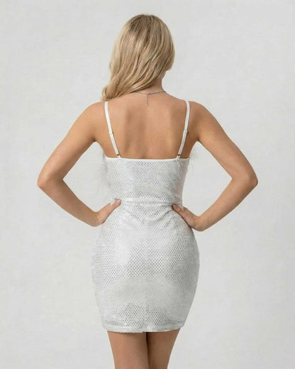 Celeste Mini Dress by SLIMONA, a stunning sequin bodycon mini with faux fur detail, showcasing a sleek silhouette.