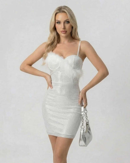 Celeste Mini Dress by SLIMONA - Sequin bodycon mini dress with faux fur detail, perfect for glamorous occasions.