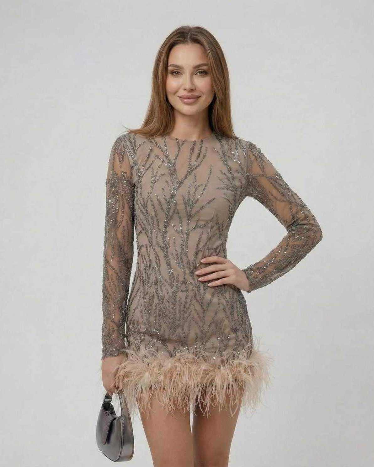Lauven Celeste Mini Dress featuring sequin embellishments and feather trim, perfect for a luxurious look.