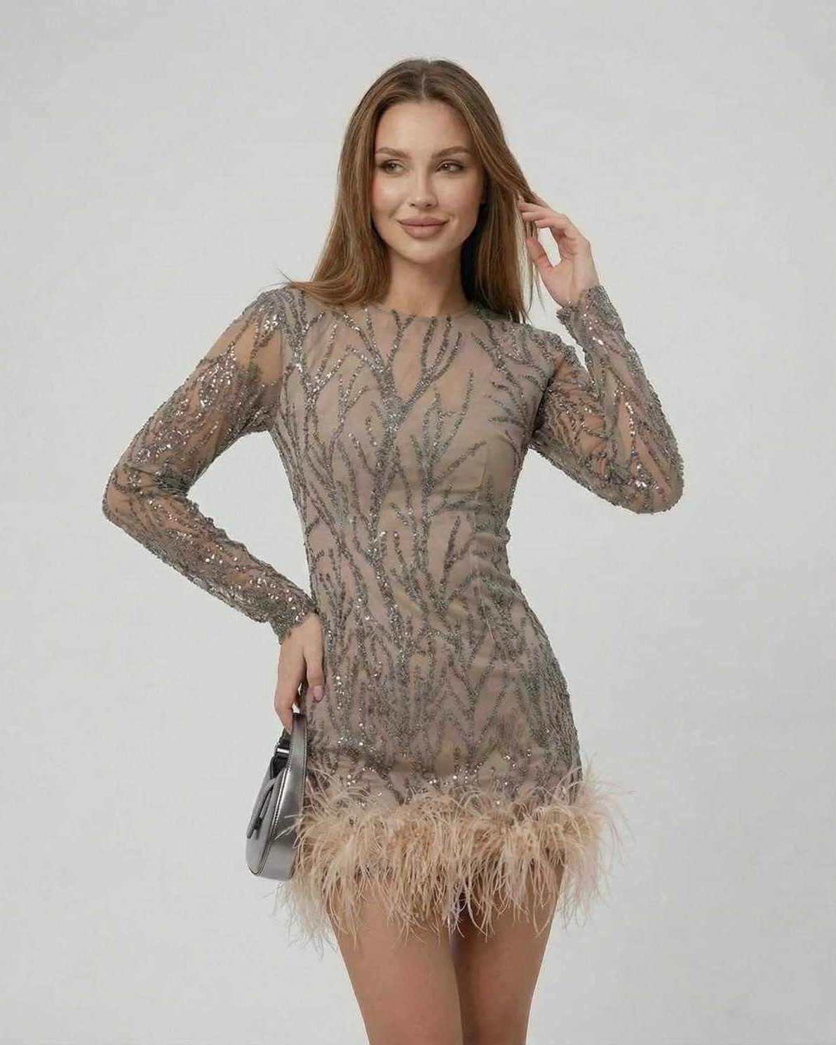 Lauven Celeste Mini Dress featuring sequin embellishments and feather trim in taupe color.