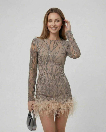 Lauven Celeste Mini Dress featuring sequin embellishments and feather trim, perfect for a luxurious look.