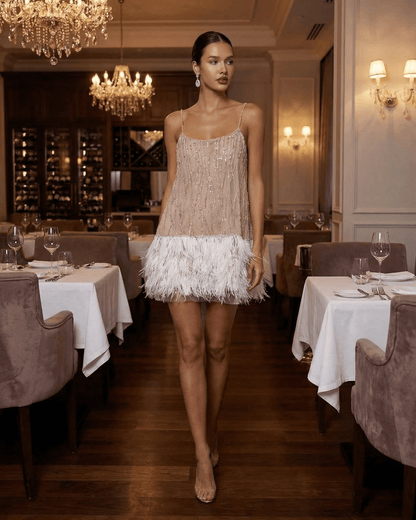 Celeste Mini Dress by SLIMONA, sequin tulle fairycore mini dress with feather tassel hem, perfect for elegant evenings.