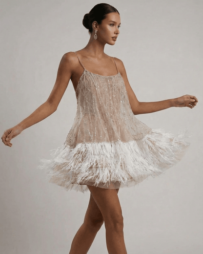 Celeste Mini Dress by SLIMONA - Sequin Tulle Fairycore Mini Dress with Feather Tassel Hem, light and airy design.