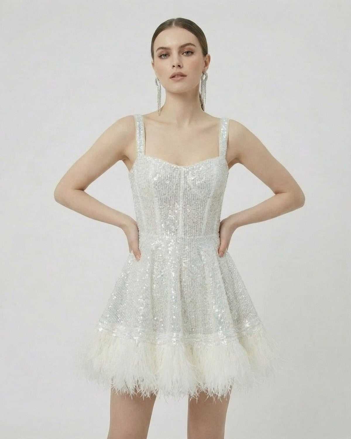 Celeste Mini Dress by SLIMONA, silver sequin A-line mini dress with faux fur hem, stylish and modern look.