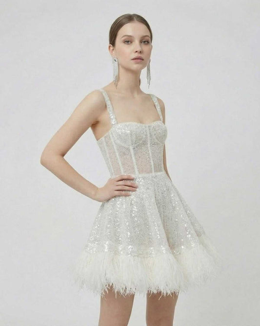 Celeste Mini Dress by SLIMONA - Silver Sequin A-Line Mini Dress with Faux Fur Hem, perfect for special occasions.