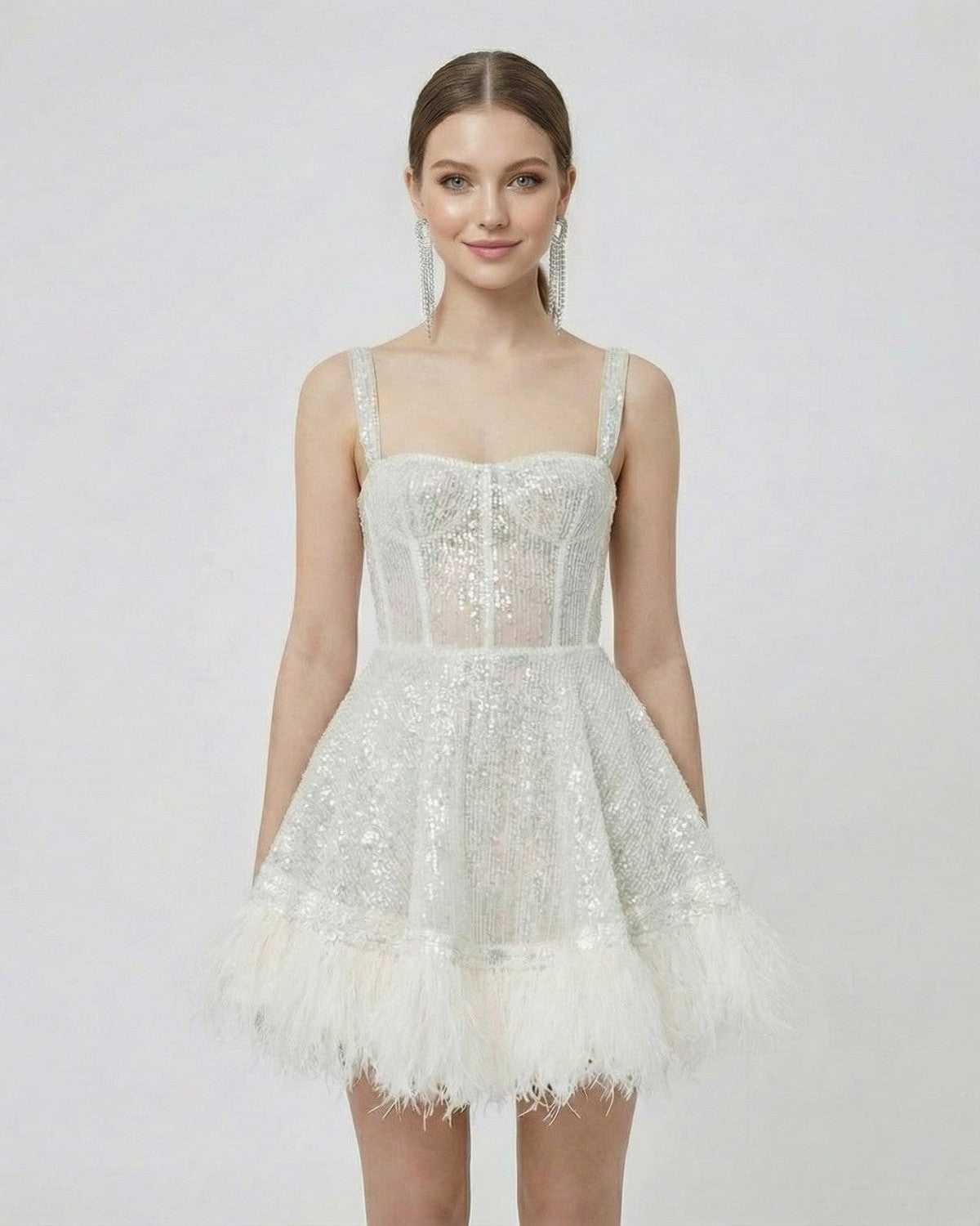 Celeste Mini Dress by SLIMONA - Silver Sequin A-Line Mini Dress with Faux Fur Hem, showcasing a modern, polished look.