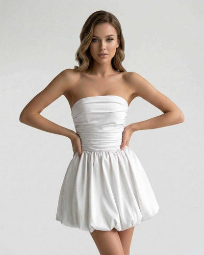 Celeste Mini Dress by Lauven – Elegant strapless white satin A-line mini dress with ruched bodice