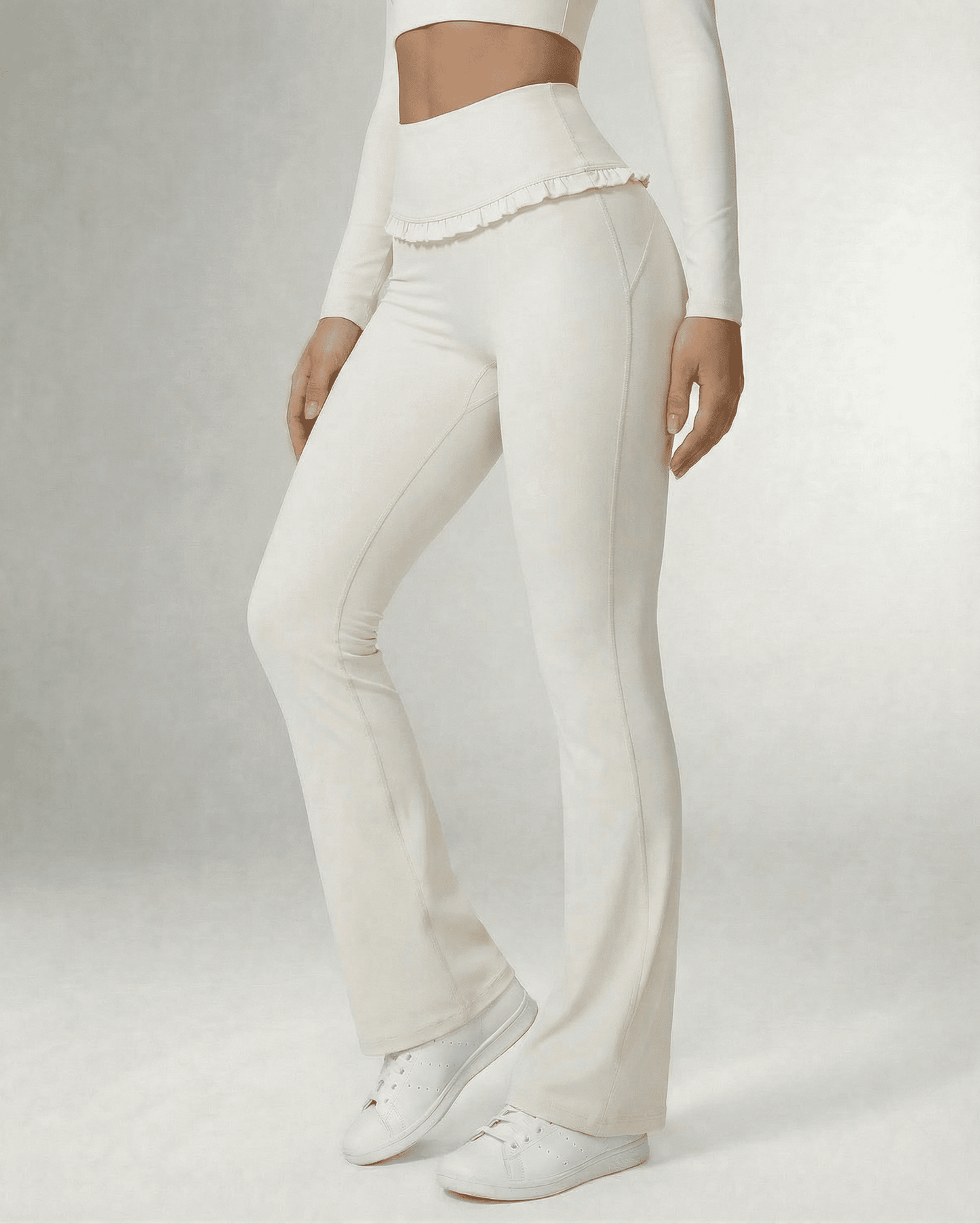 Celeste Leggings by SLIMONA, elegant white flare pants with pockets and a flattering silhouette.