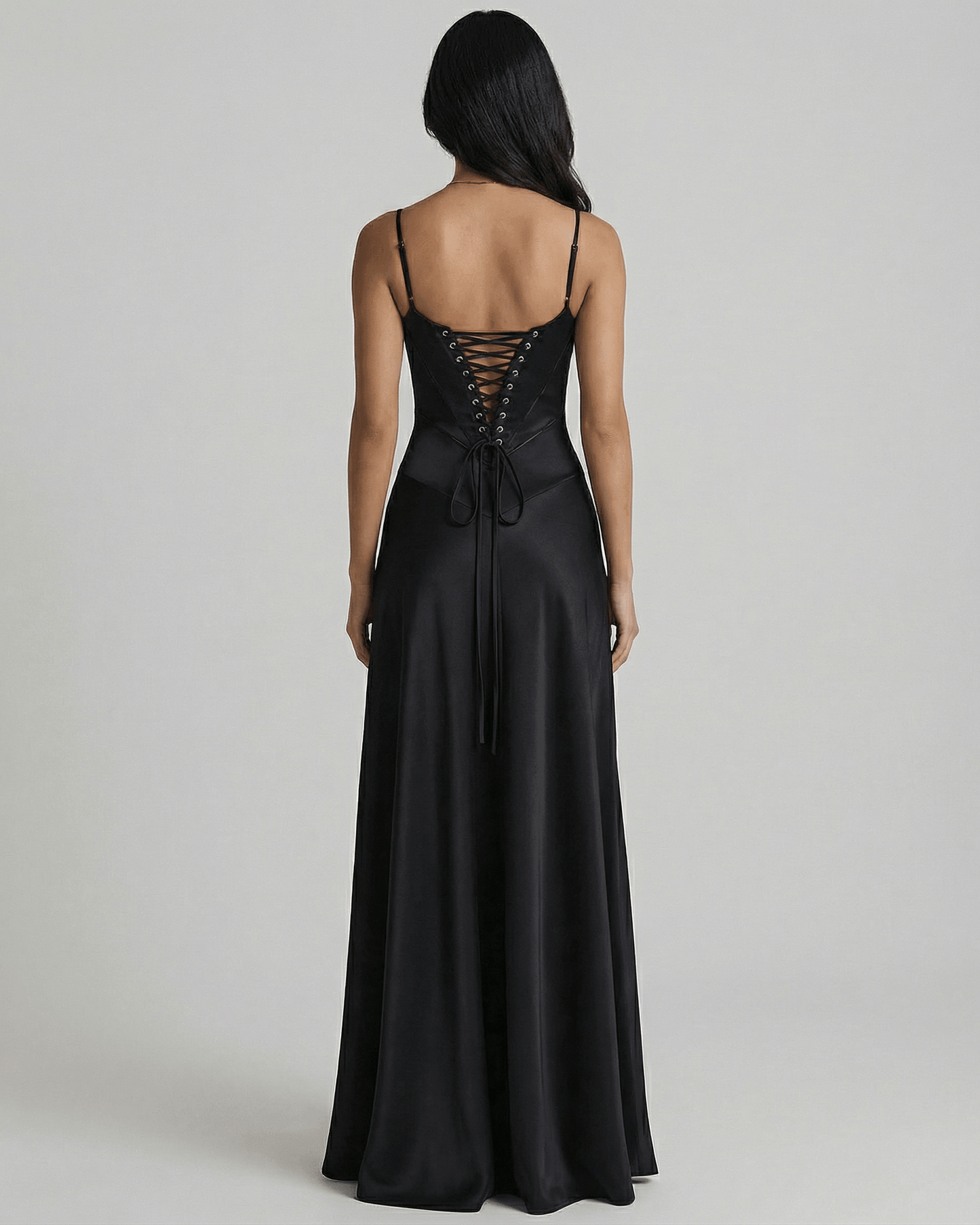 Celestia Maxi Dress by Lauven showcasing a black satin lace-up back design and elegant full-length silhouette.