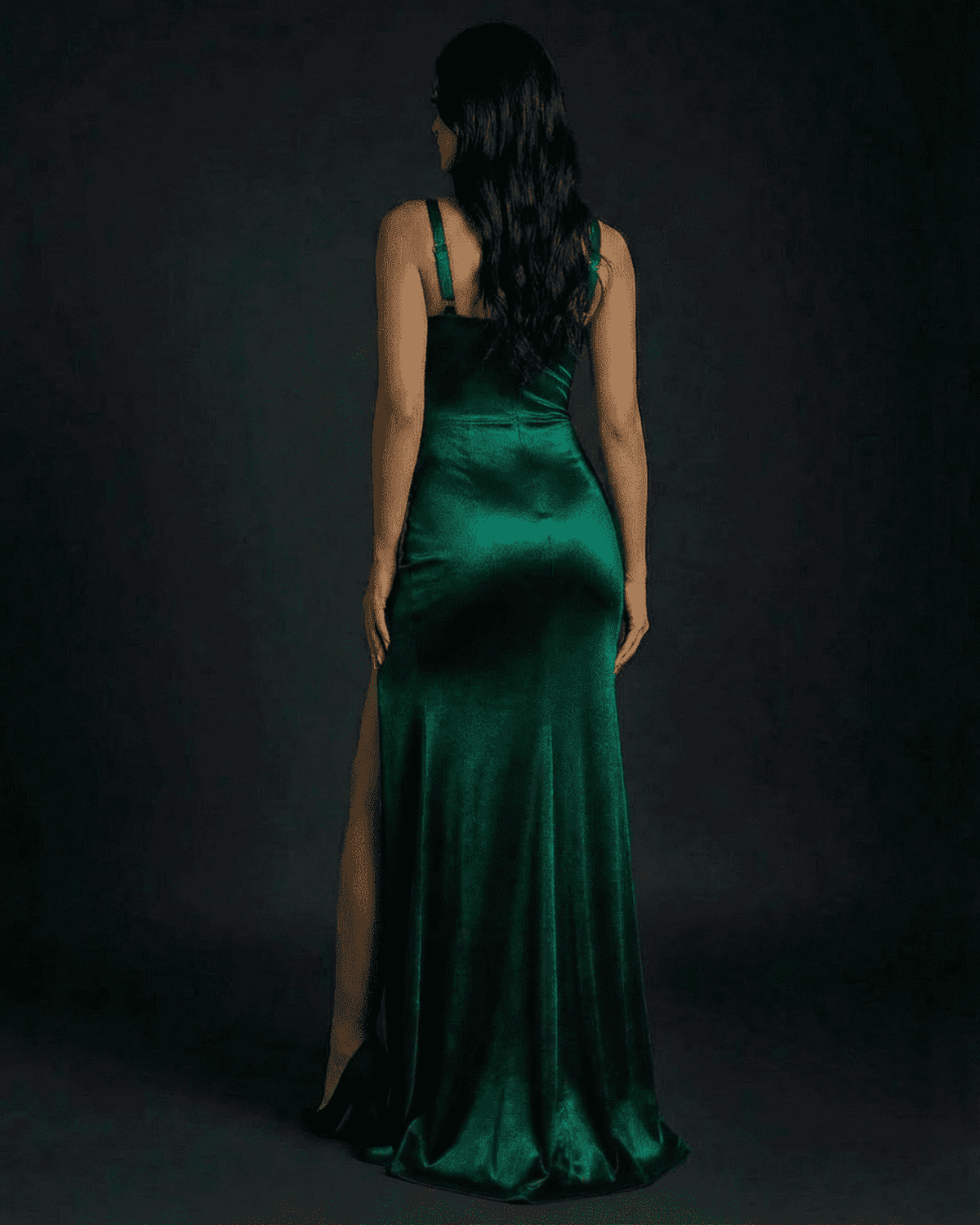 Celestine Maxi Dress by SLIMONA, featuring a sleek emerald green satin finish and stylish high slit.