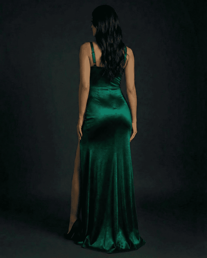 Celestine Maxi Dress by SLIMONA, featuring a sleek emerald green satin finish and stylish high slit.