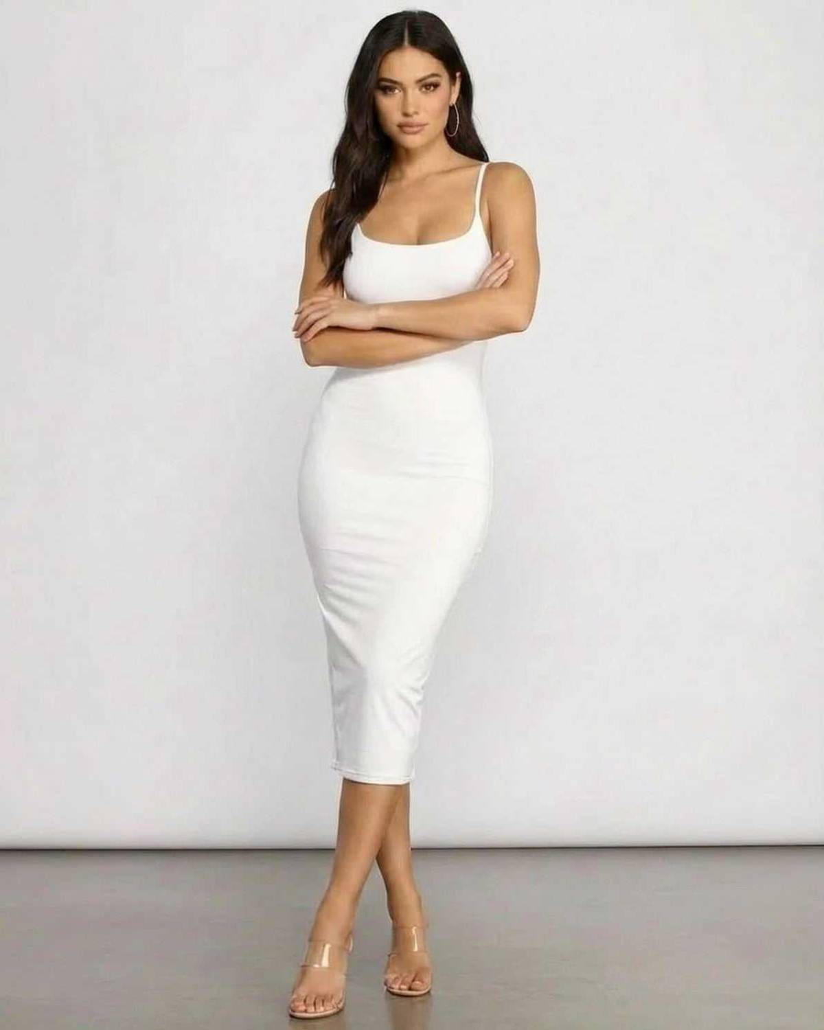 Clara Midi Dress by SLIMONA, showcasing a sleek white knit silhouette, perfect for any elegant occasion.