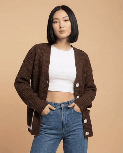 Cocoa Cardigan by SLIMONA worn with a white top and jeans against a neutral background, showcasing color block design.