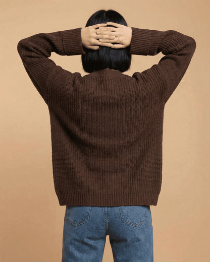 Back view of a model wearing the Cocoa Cardigan by SLIMONA, showcasing its relaxed fit and textured knit design.