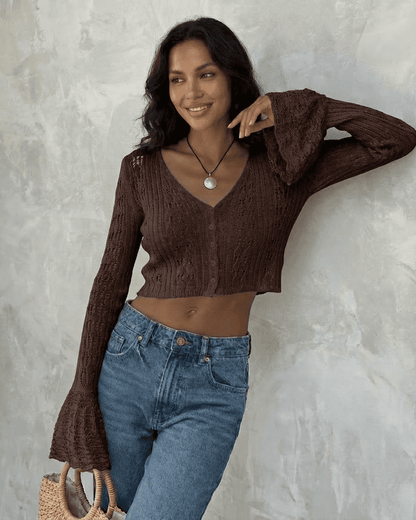 Cocoa Cardigan from SLIMONA in cropped cotton knit with flare sleeves, styled effortlessly with jeans.