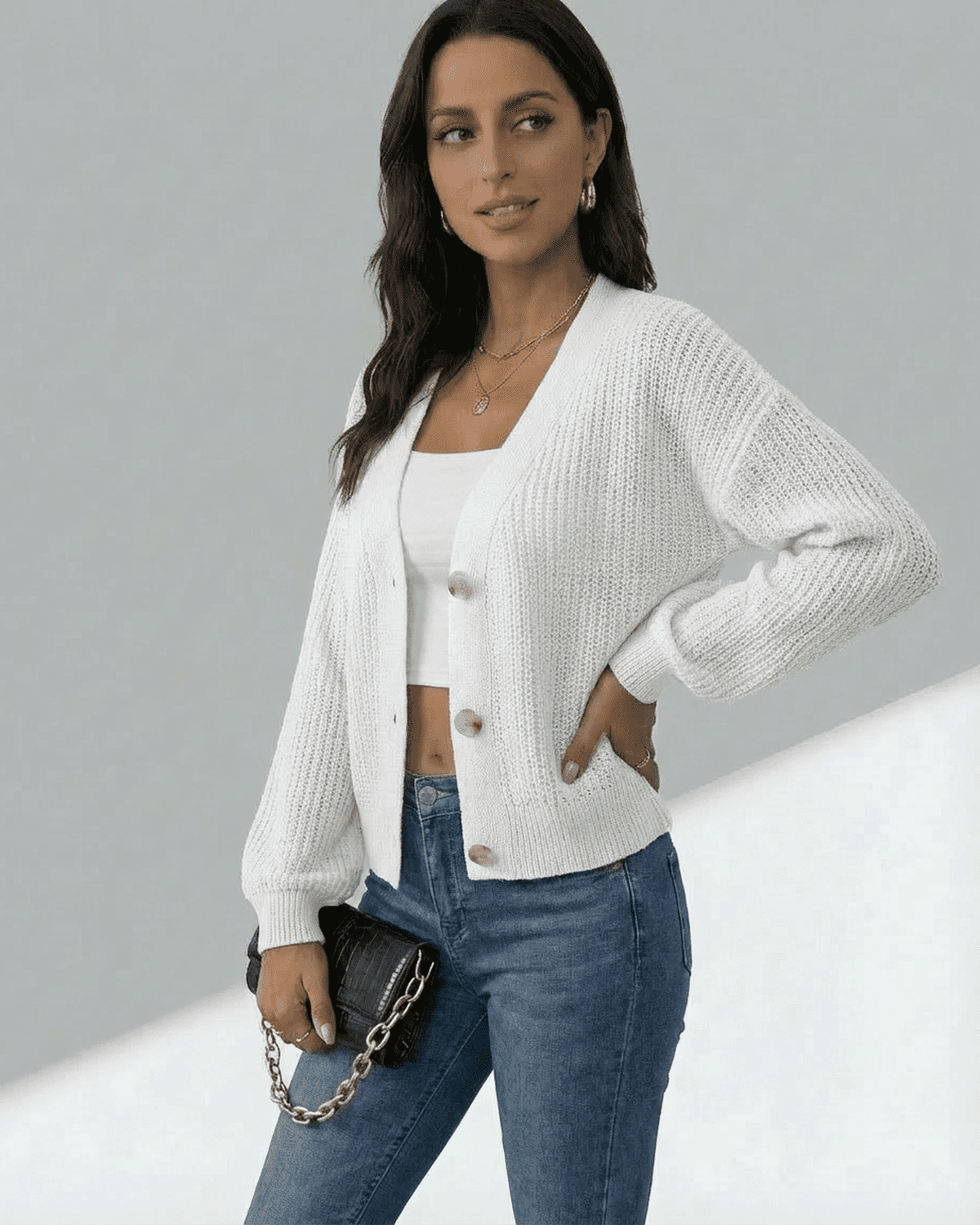 Elara Cardigan by SLIMONA, lightweight button-front knitwear in white, styled with casual jeans.