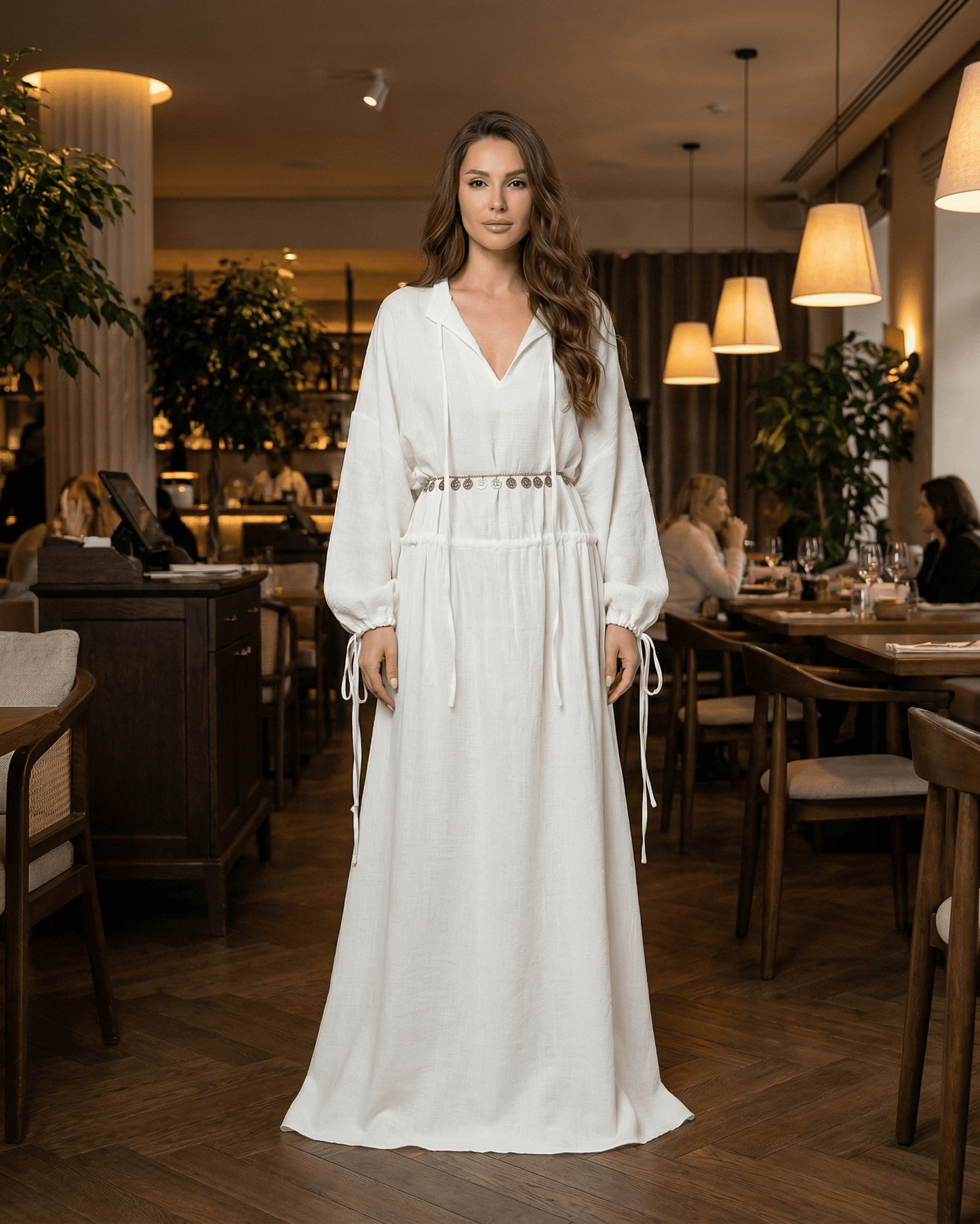 Elara Maxi Dress by SLIMONA, a white cotton A-line maxi dress with adjustable waist and long sleeves.