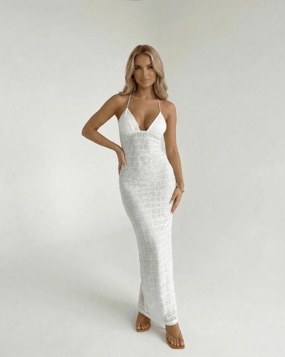 Elara Maxi Dress by Lauven, featuring a lace V-neck halter design and fitted sheath silhouette in white.