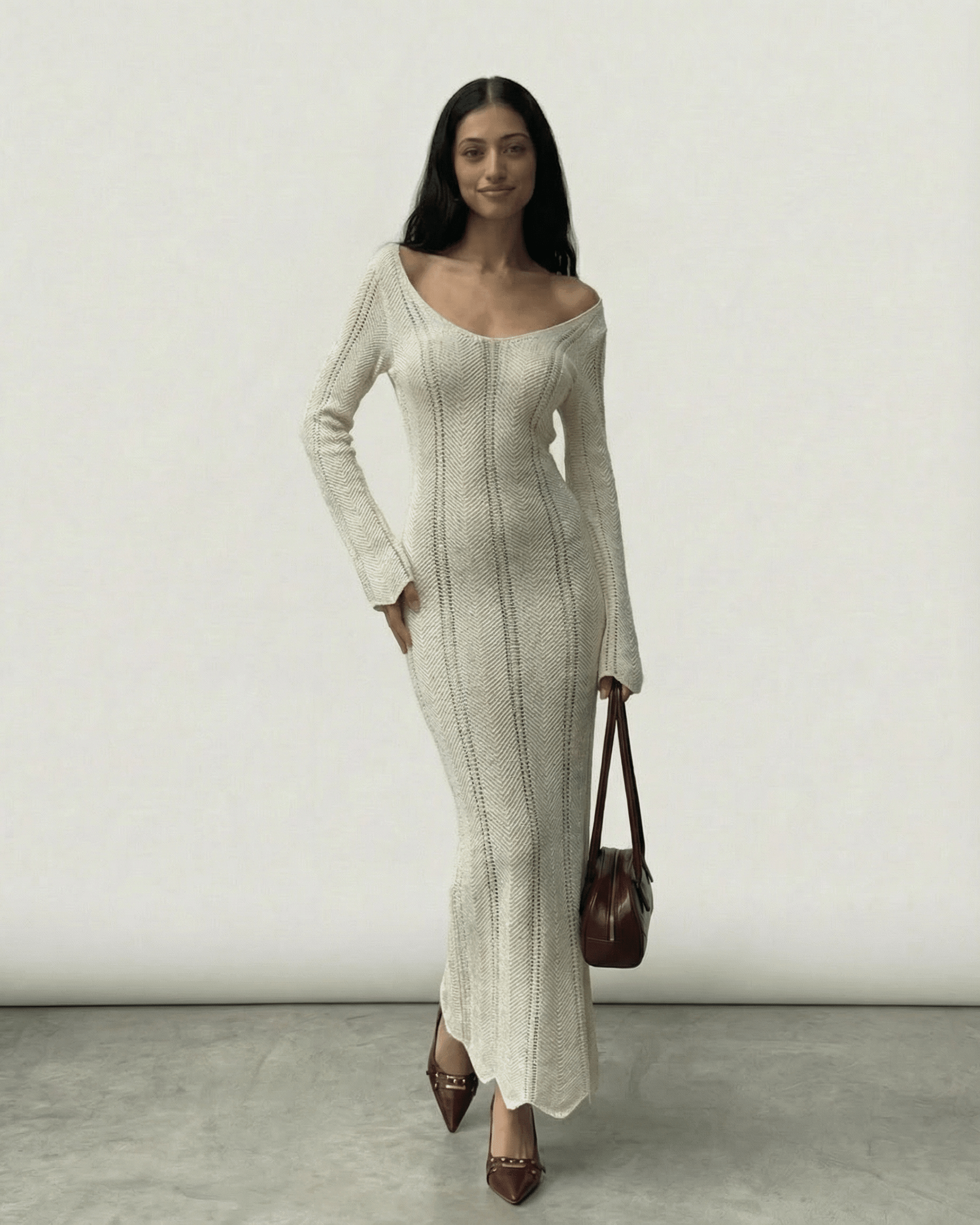 Elara Maxi Dress by Lauven, ribbed bodycon silhouette with long flare sleeves, elegant and stylish.