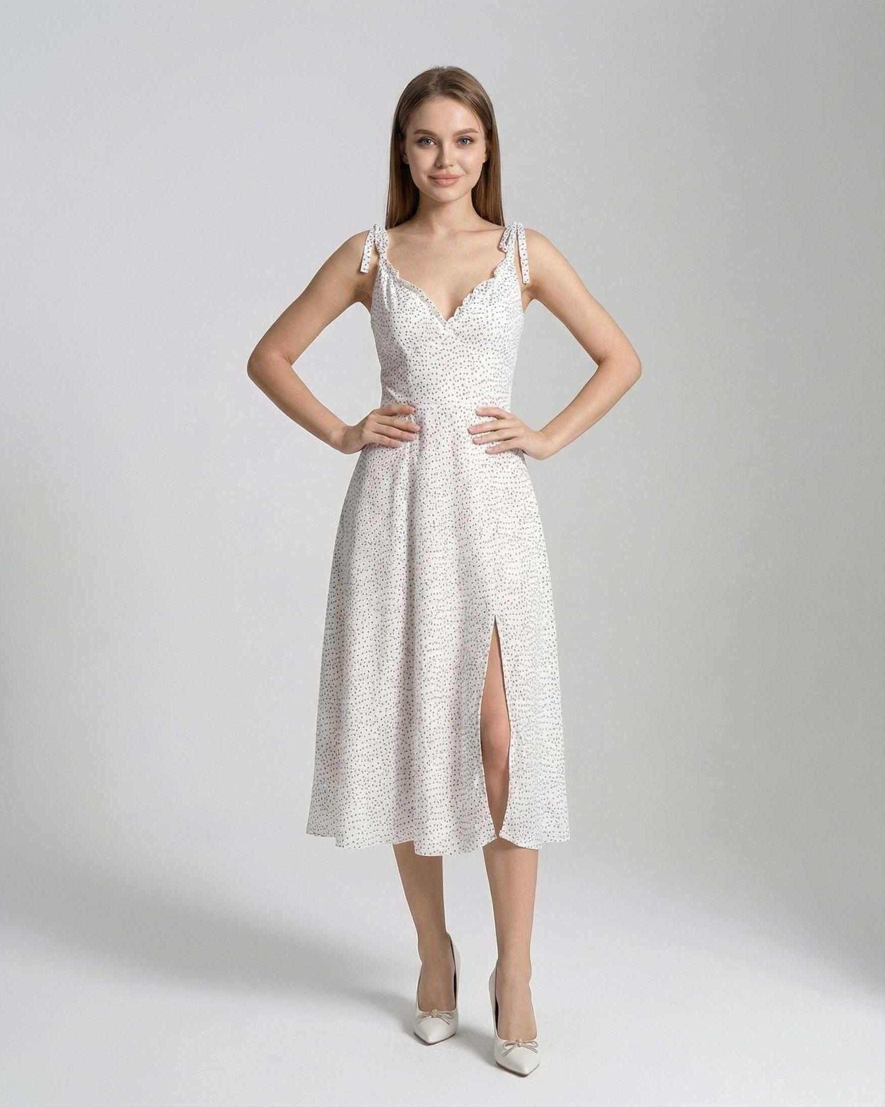 Elara Midi Dress by Lauven - Elegant A-Line design with polka dot detail and high slit for sophisticated style.