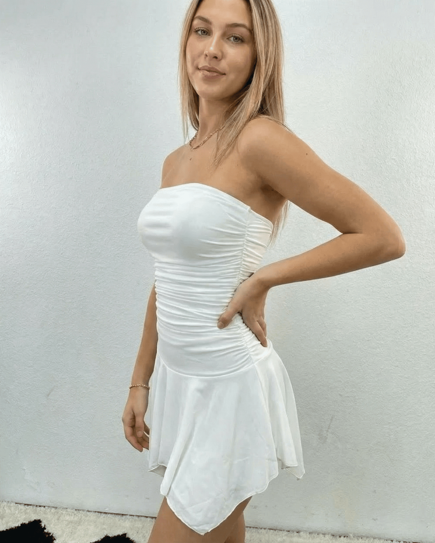Elara Mini Dress by Lauven - Strapless white ruched mini dress with flowy hem and refined silhouette.