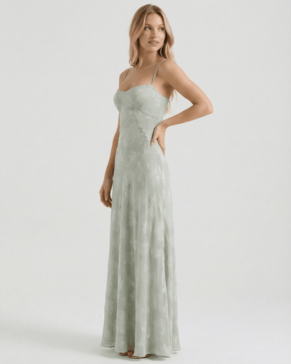Eliara Maxi Dress by Lauven, elegant floral print maxi dress in sage green with sheer fabric and lace-up back.