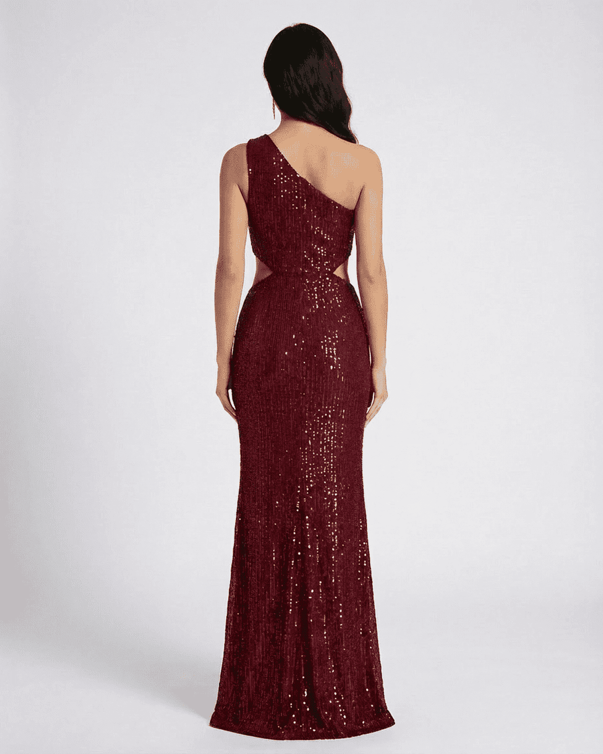 Back view of Ember Maxi Dress by SLIMONA, featuring a one-shoulder design and stunning sequin embellishments.