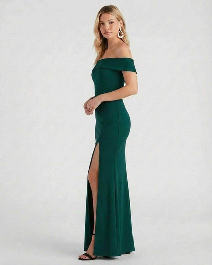 Emerald Maxi Dress by SLIMONA showcasing elegant off-the-shoulder design and high slit for a sophisticated look.