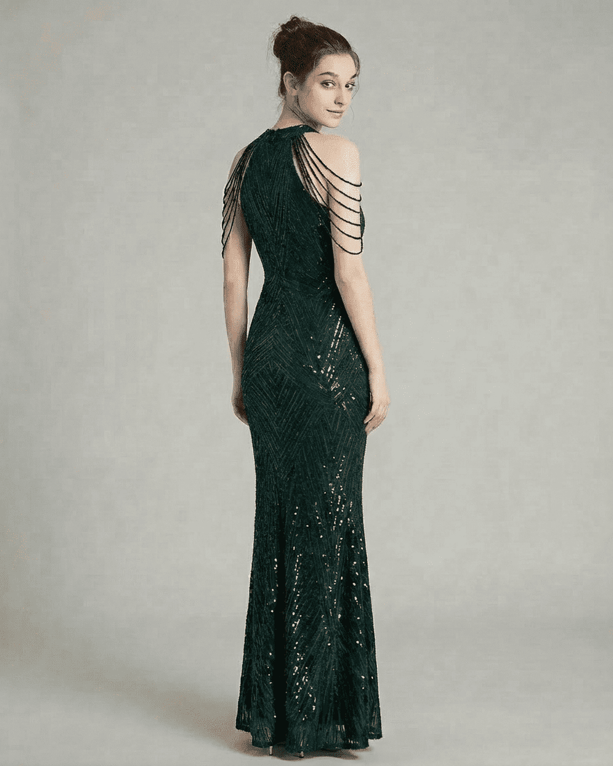 Emerald Maxi Dress by SLIMONA, showcasing a stunning sequin halter design with elegant beaded shoulder drapes.