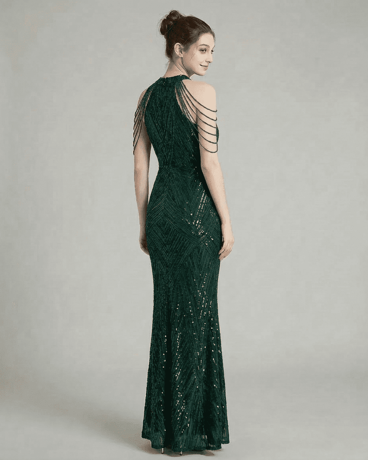 Emerald Maxi Dress by SLIMONA featuring sequin detailing and halter neckline in rich green velvet.