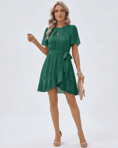 Emerald Ruffle Dress by Lauven featuring flutter sleeves and waist tie in rich emerald green.