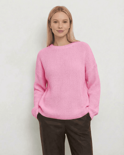 Fiora Sweater by SLIMONA in soft pink, featuring loose fit and round neck, perfect for cozy fall and winter styling.