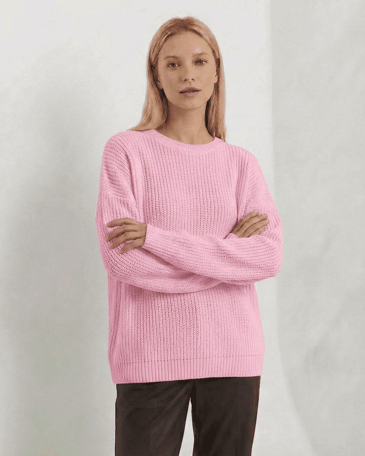 Fiora Sweater by SLIMONA in pink, featuring loose fit and ribbed knit design, perfect for cozy fall and winter styling.