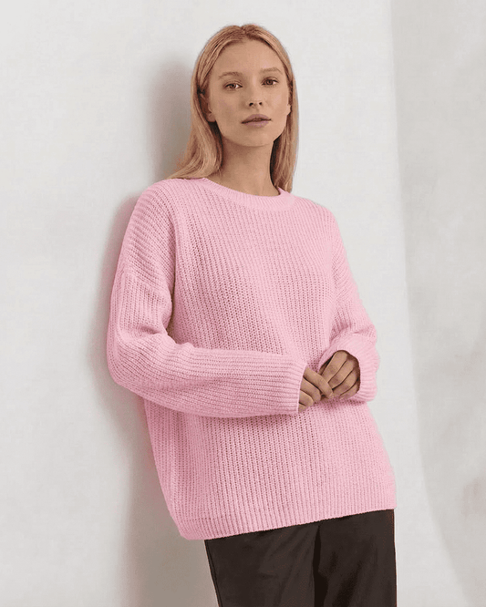 Fiora Sweater by SLIMONA in pink, featuring a loose fit, thick ribbed knit, and round neck for women.