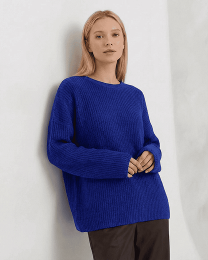 Indira Sweater by SLIMONA - Loose fit thick ribbed knitwear in vibrant blue color, perfect for colder months.